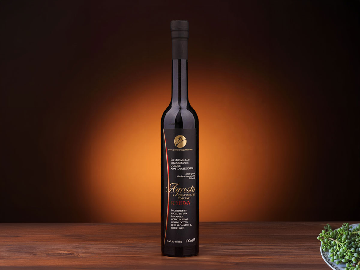 Bottle of Agresto Riserva, a barrel-aged Italian condiment with complex vegetal, spicy, and sweet cooked must notes, perfect for meats, vegetables, and salads.