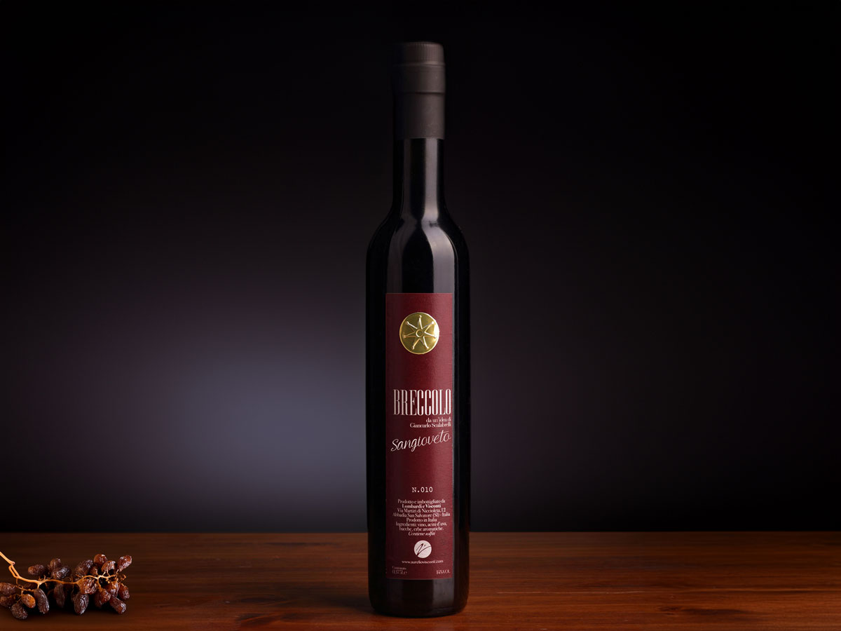 Bottle of Breccolo Sangioveto, an Italian enolito wine infused with rare dried Tuscan grape varieties, offering unique and surprising flavours for wine connoisseurs.