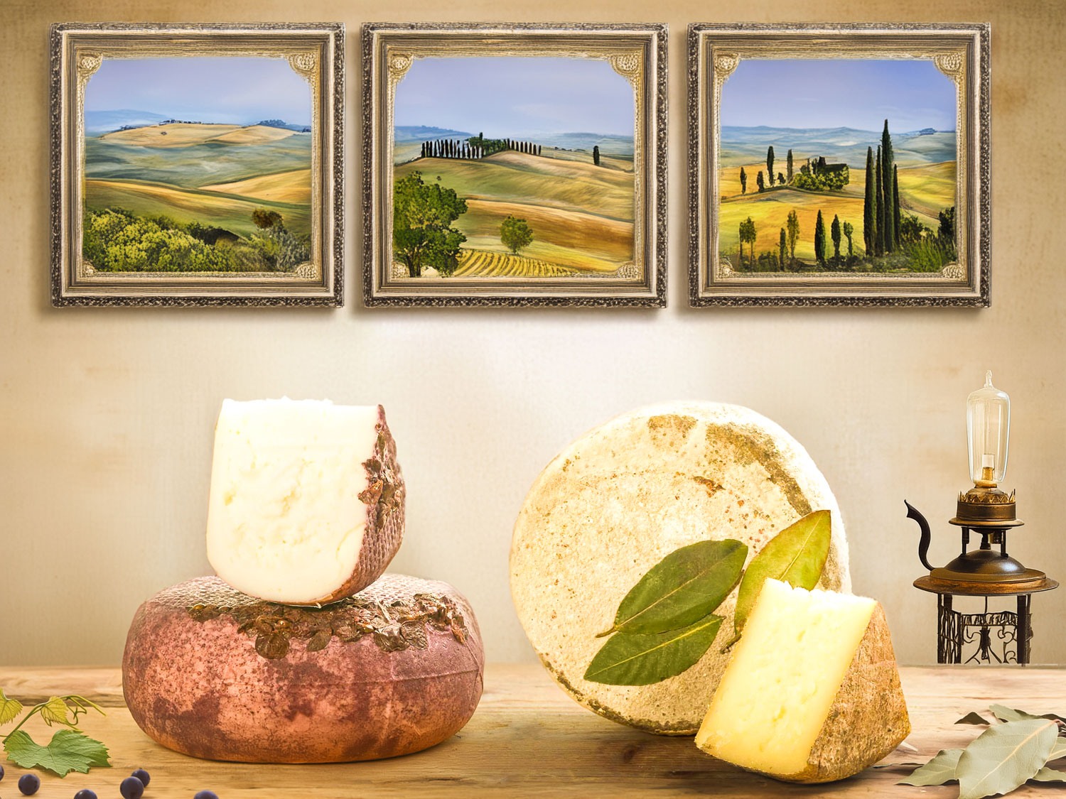 Two Fermented Pecorini on a wooden table