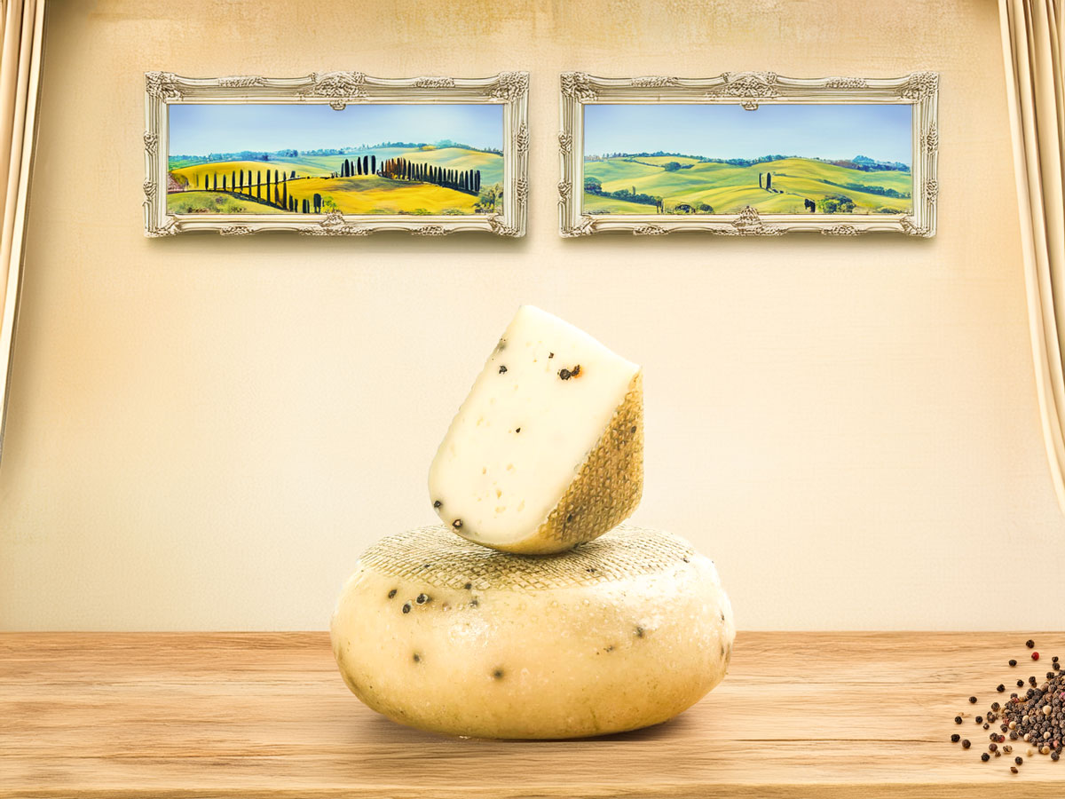 Pecorino di Pienza with Black Pepper – artisanal sheep’s milk cheese from Tuscany with a delicate balance of creamy flavour and a hint of spicy black pepper.
