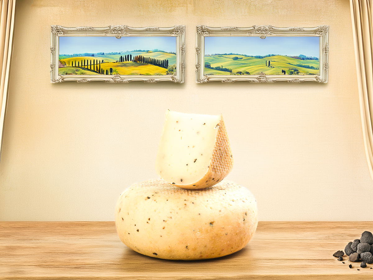Pecorino di Pienza with Truffle – artisanal Tuscan sheep’s milk cheese infused with black truffle, offering rich, earthy flavours and a creamy texture.