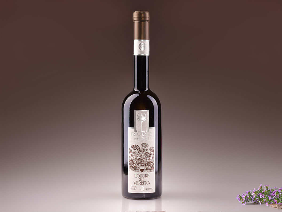 Image of Verbena Liqueur bottle showcasing its transparent liquid and elegant design, crafted from aromatic verbena and herbs, rooted in Siena's tradition.